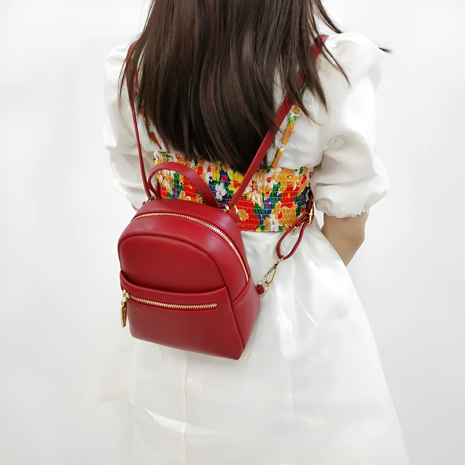 Soft PU mini backpack in street trend style with multiple internal compartments including mobile phone pocket