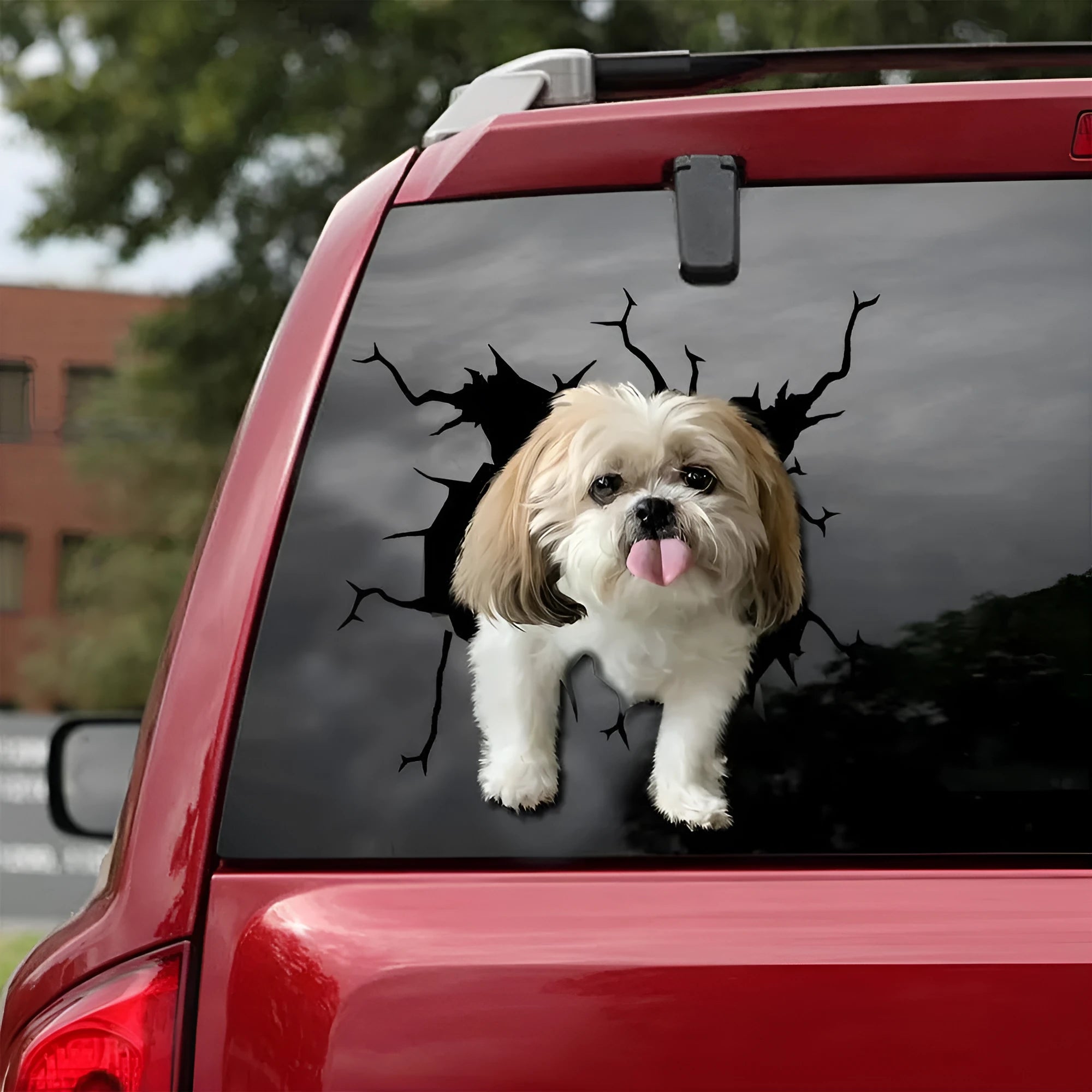 Reflective torn-paper style dog silhouette window decal shown in three sizes.
