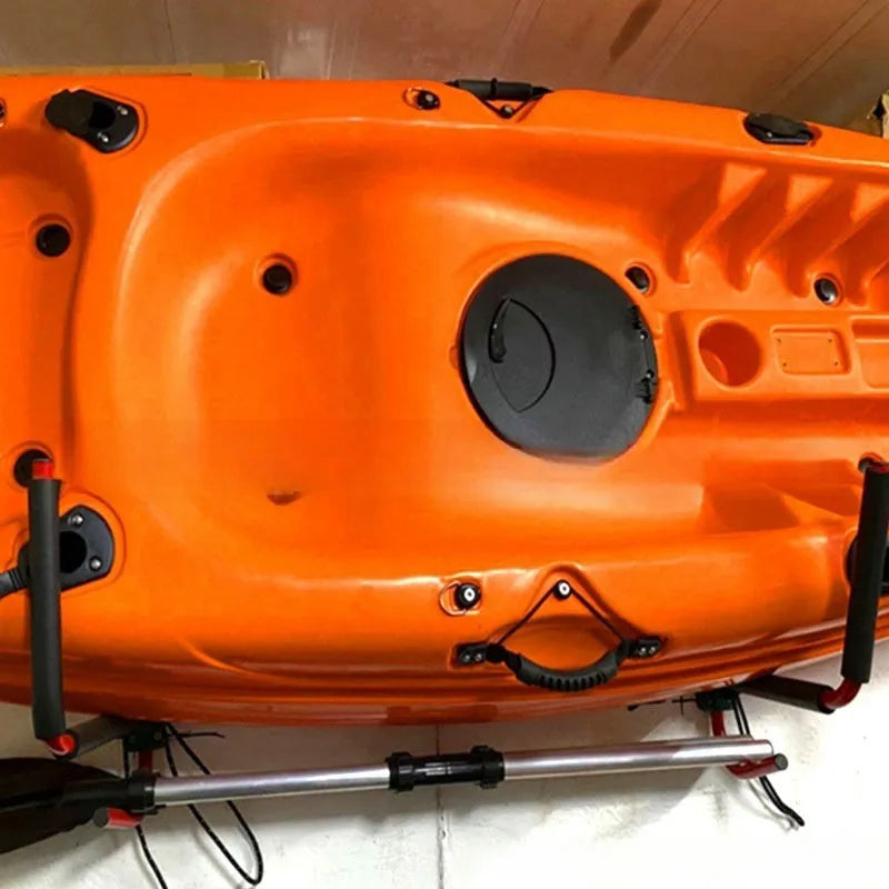 Carbon steel kayak and surfboard wall hanger rack for vertical storage.