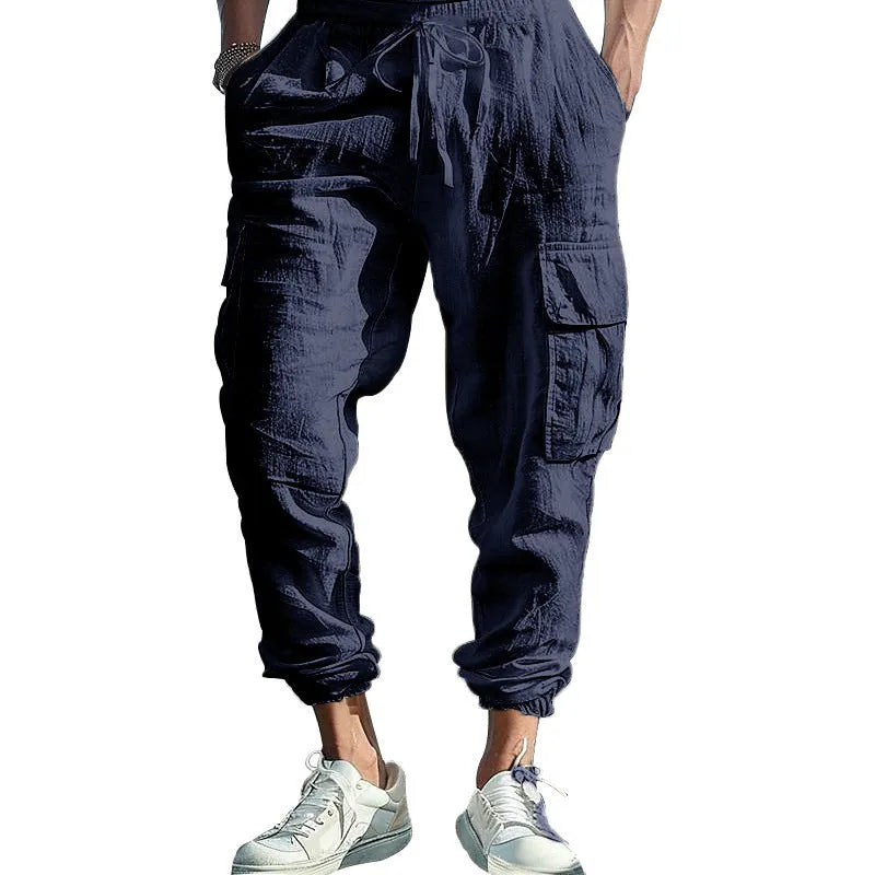 Men's casual linen trousers with ankle ties and multiple pockets in solid colour options