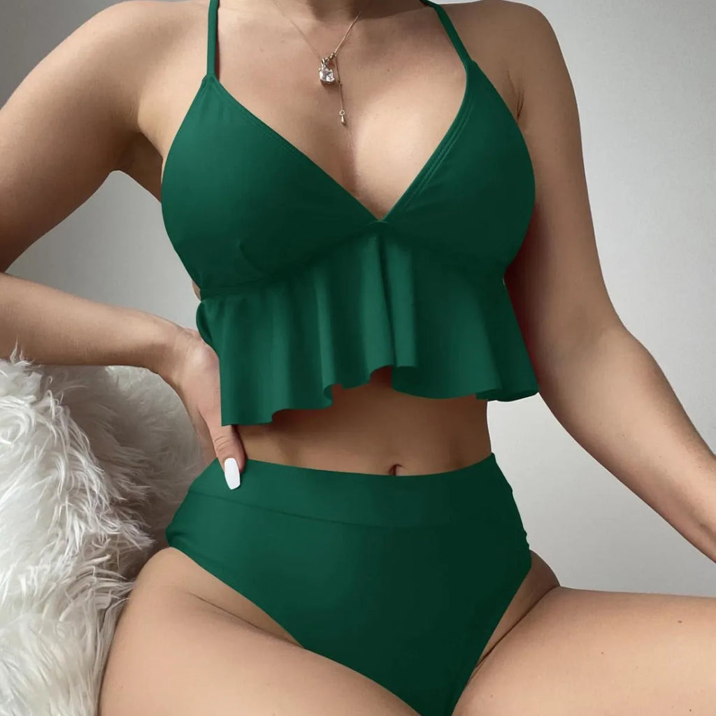 Women's solid colour high-waisted bikini with adjustable ties on the top.