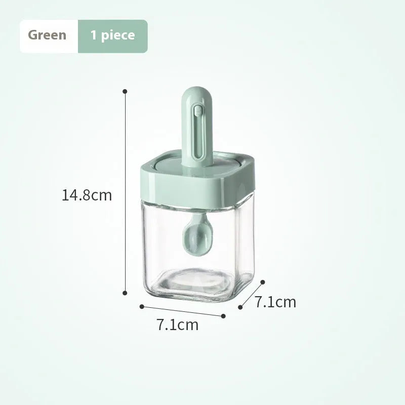 Yellow retractable glass seasoning jar with lid in Nordic style on kitchen counter