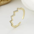 ECG Wave V-shaped zircon ring in gold colour on white background