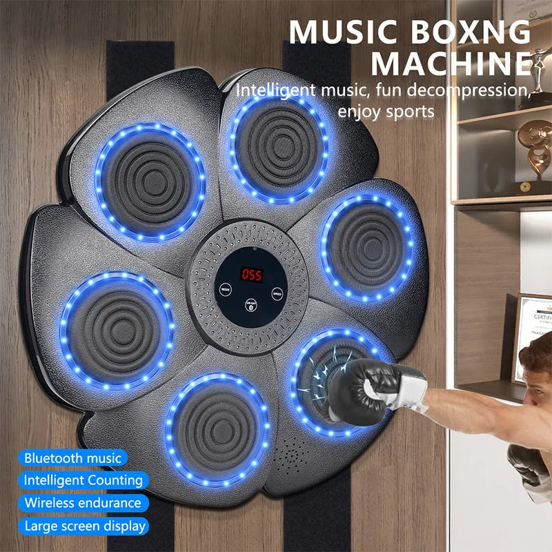 Black smart boxing wall target with LED lights and half-finger gloves on a wall for indoor training.