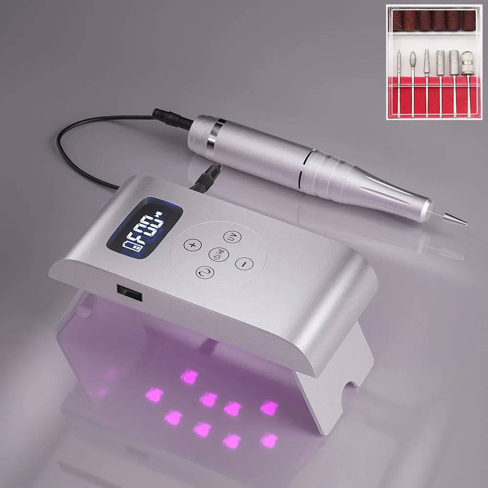 Silver battery nail polisher with stainless steel body and UV lamp on white background