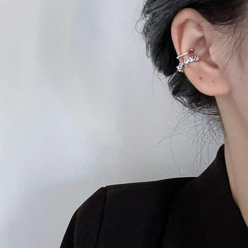 A pair of irregular geometric frosty finish ear clip earrings in colour B4710.