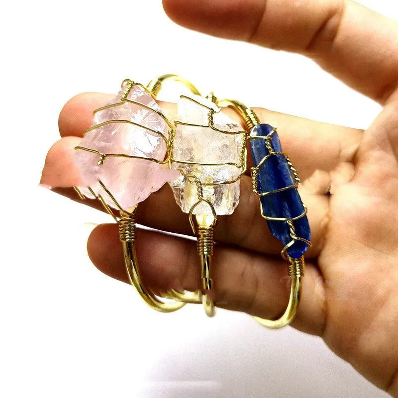 Gold winding geometric bracelet with natural crystal rough stones in bohemian ethnic design
