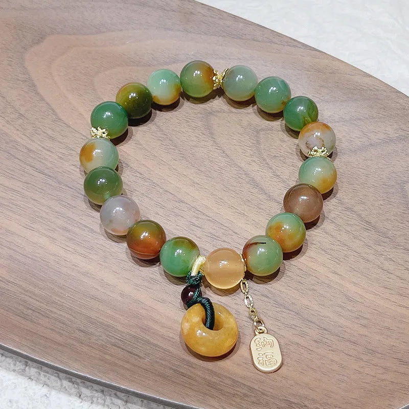 Peacock agate coloured women's bracelet with a peace buckle, made from agate and alloy.