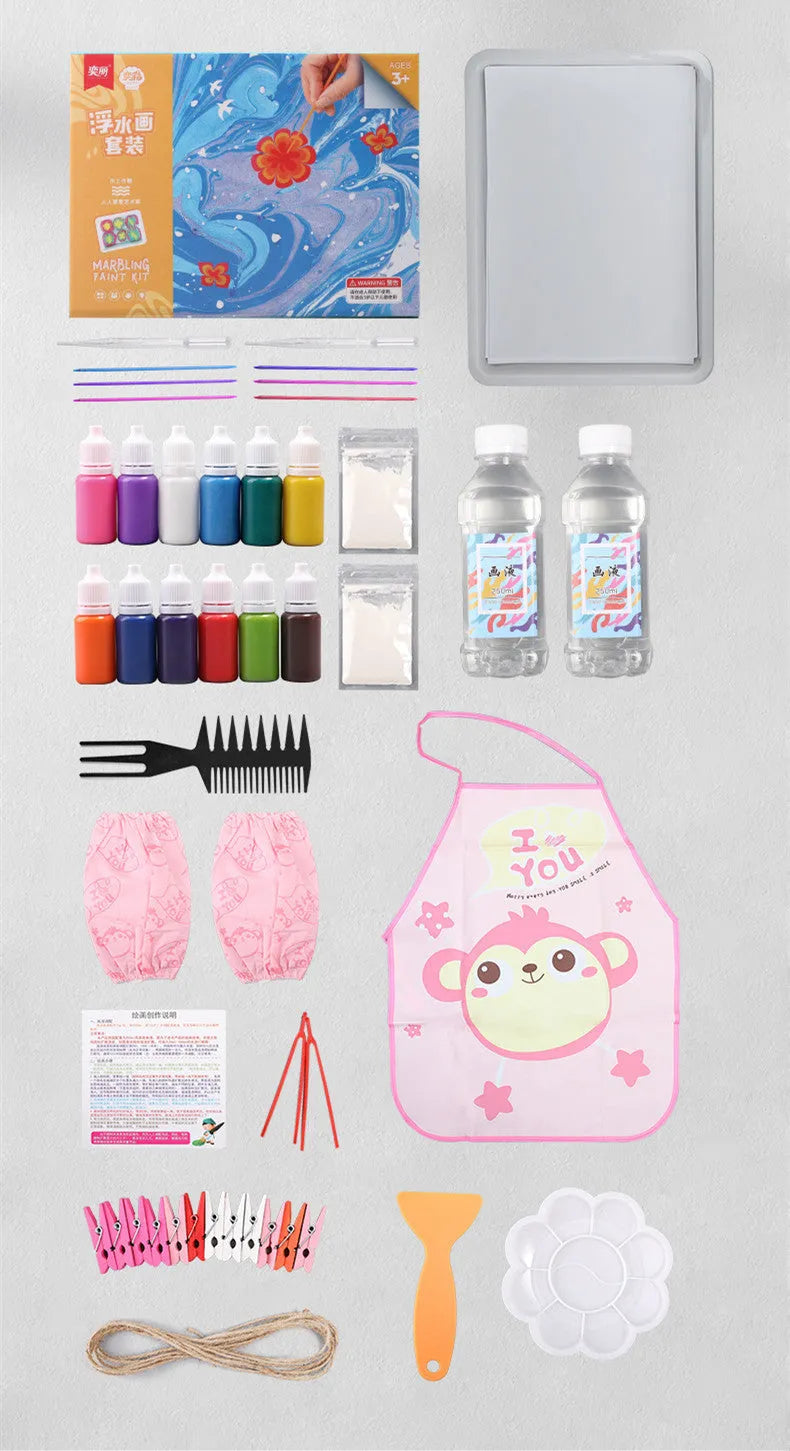 Hand painted doodle educational toy set with gouache paints, concentrated liquid, stirring rods, and drawing paper on a table