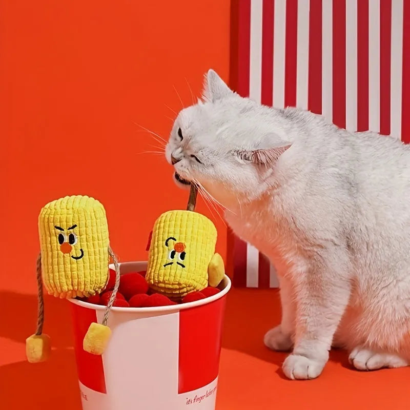 Natural corn cob and wood cat chew toy with catnip for dental hygiene, shown with dimensions 7cm by 6cm by 15cm.