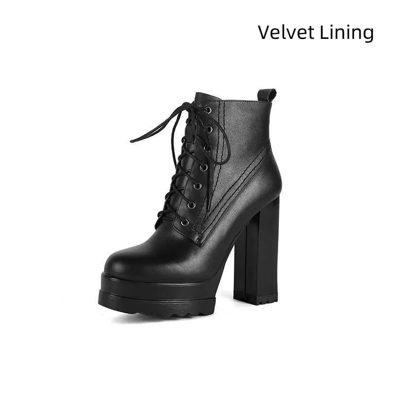 Women's black chunky heel waterproof platform ankle boots with side zip on a white background