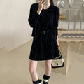Grey knitted two-piece set with 3D pattern, featuring a belted vest skirt and long-sleeve cardigan.
