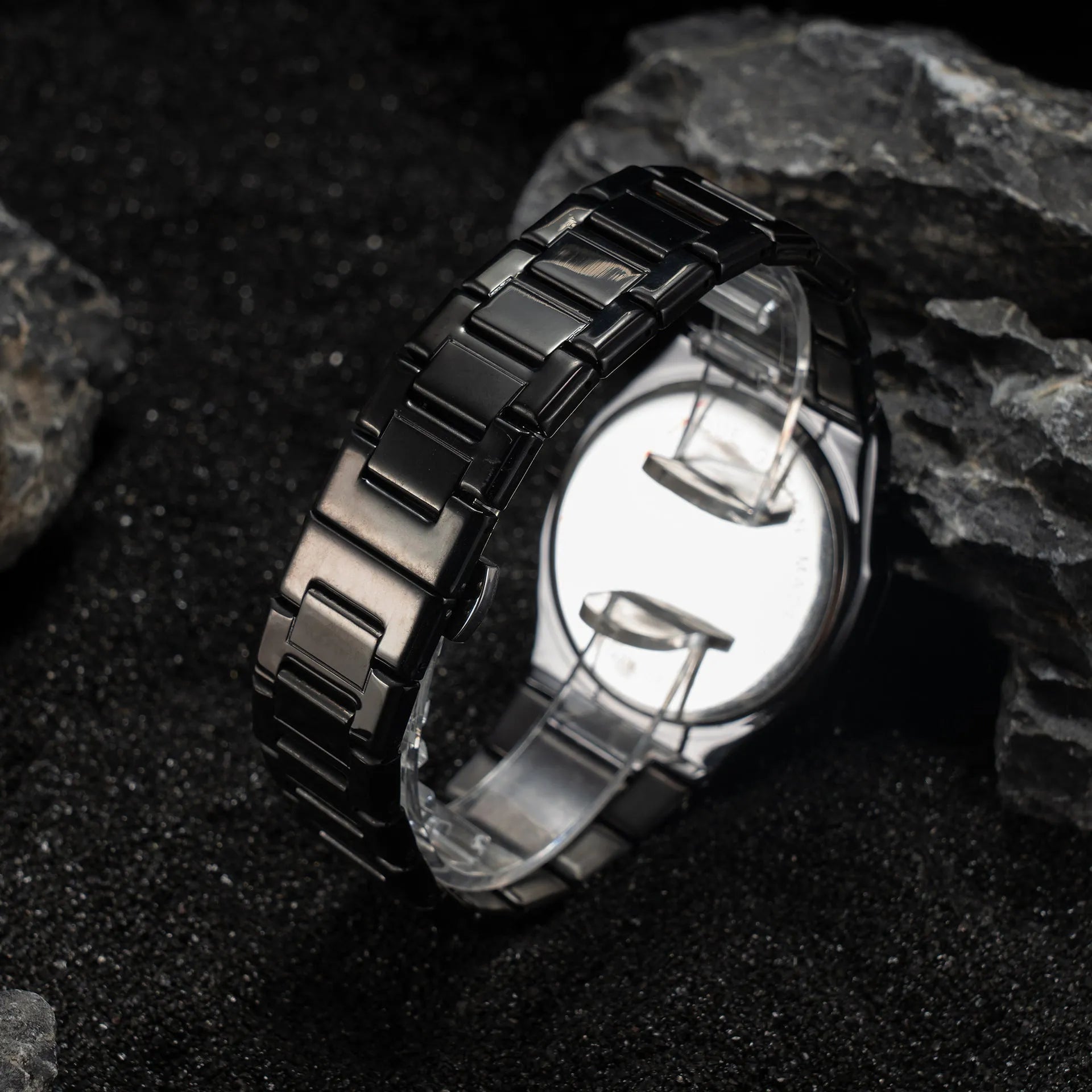 Men's business casual quartz watch with steel bracelet showing slim 10mm case profile