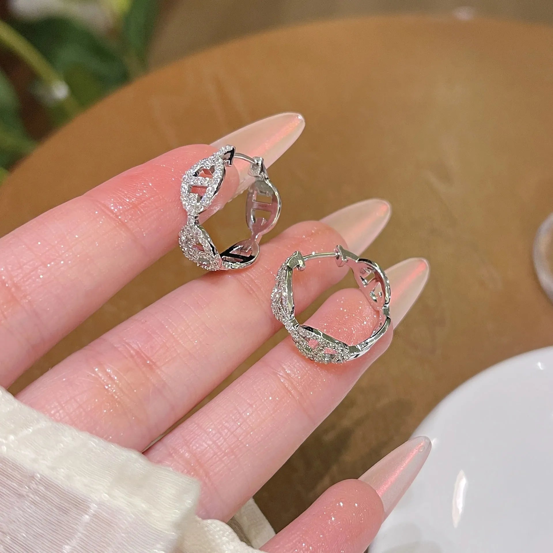 Ladies diamond design earrings in silver, gold, or rose gold finishes with thick gold plating on copper