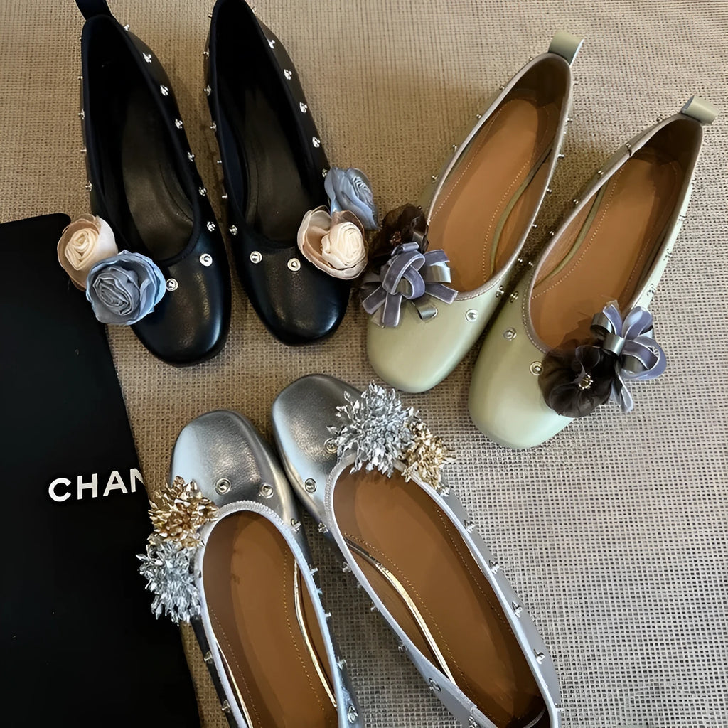 Women's silver buckle Mary Jane casual shoes with a flat rubber sole and sheepskin upper.