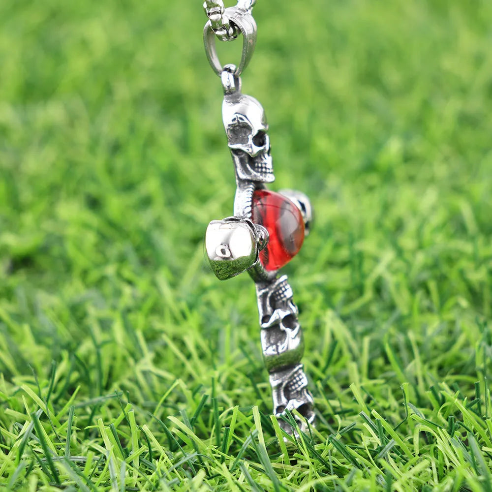 Stainless steel skull red eye cross pendant necklace with polished finish on 60cm square pearl chain, steel colour