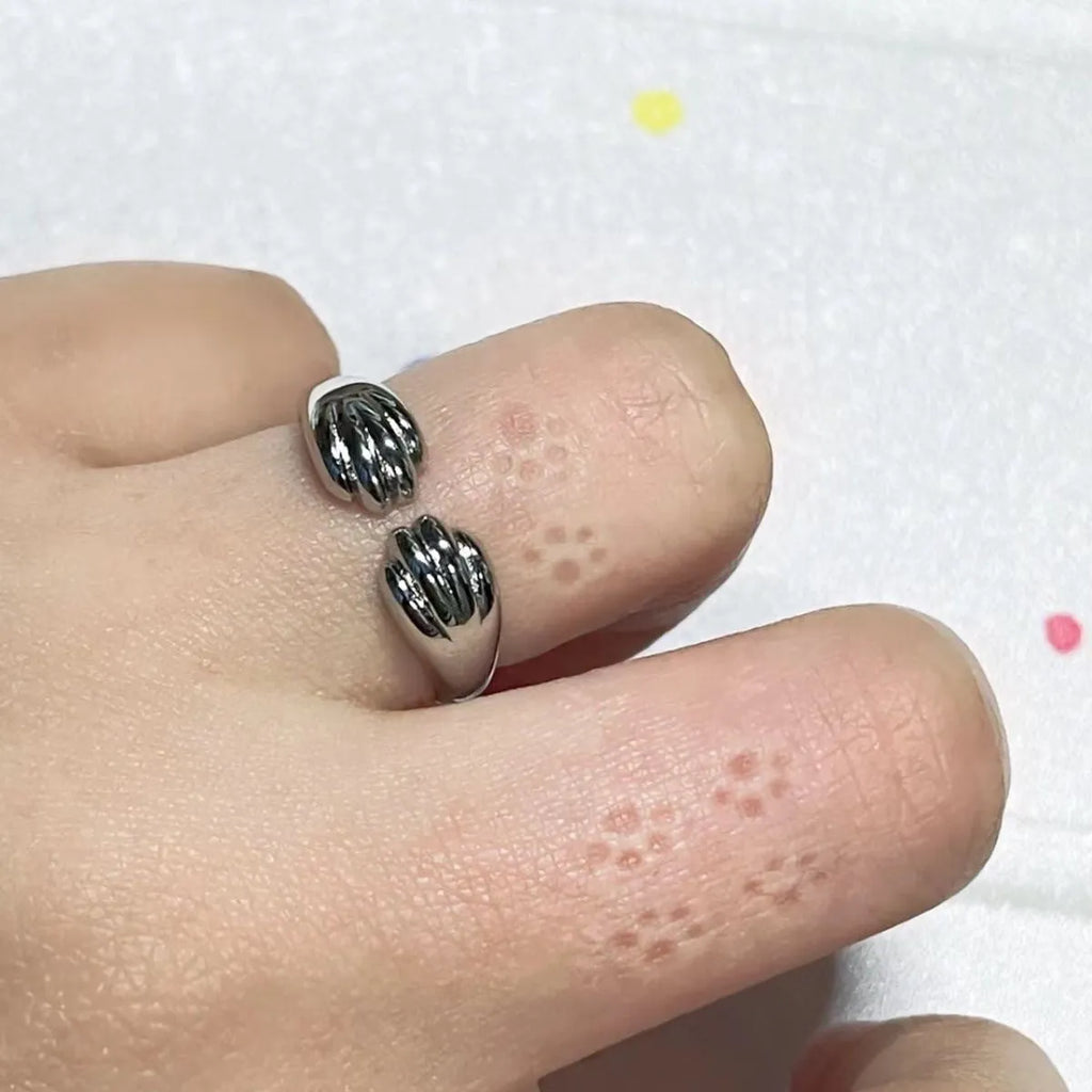 Cute kitten paw print ring in alloy with electroplated finish, unisex cartoon animal style