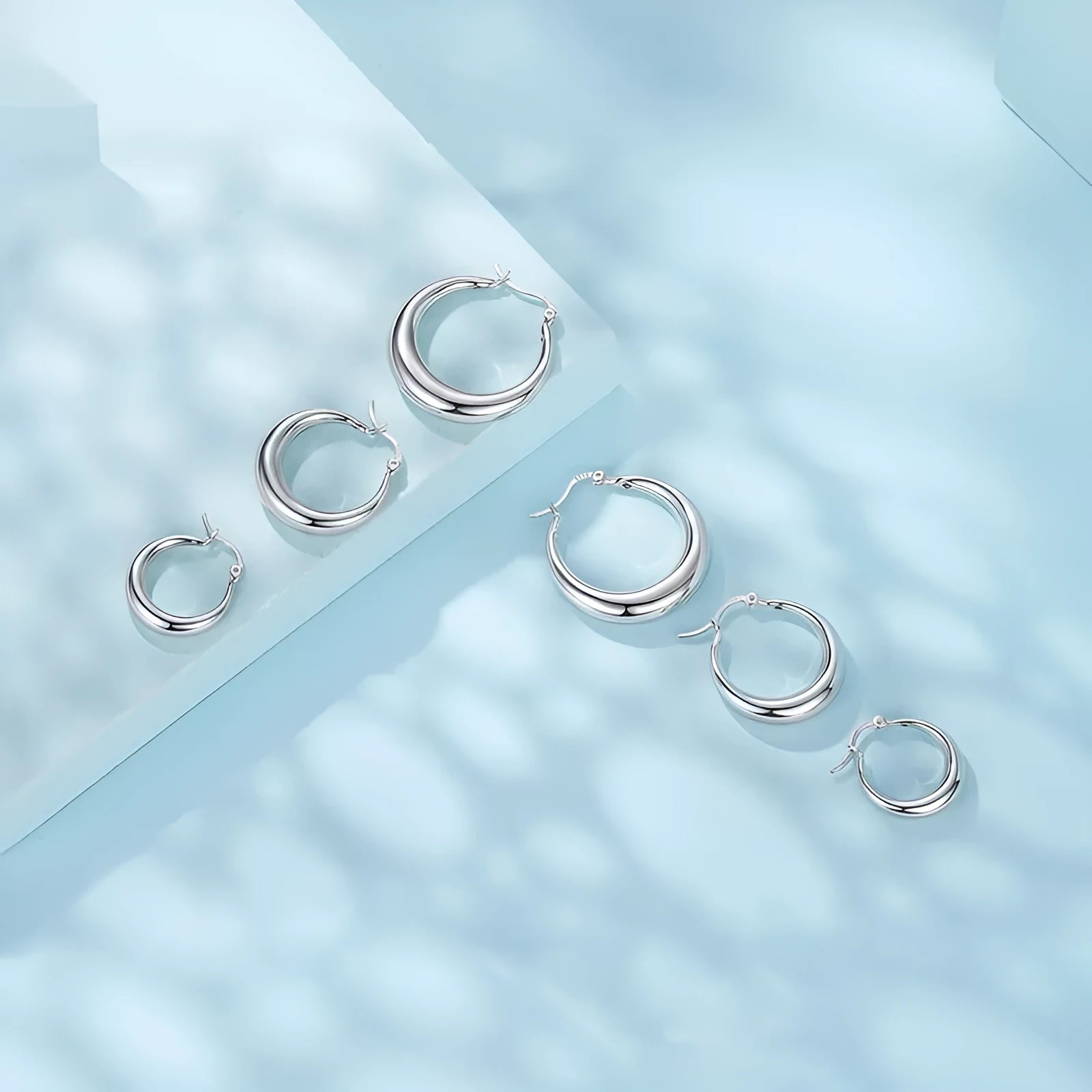 Copper ring clip earrings with silver electroplated needle in classic geometry design