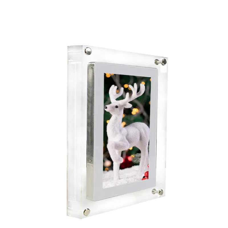 White acrylic digital photo frame with 5-inch vertical screen showing family photos