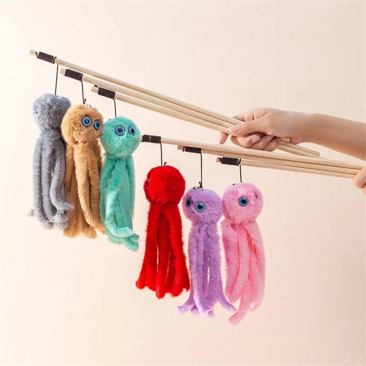 Colourful octopus cat toy with long stick and feather elements for indoor play