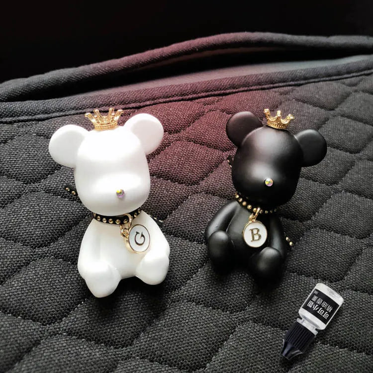 Black rivet bear car mounted gypsum perfume accessory clipped onto a car air conditioner air outlet