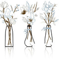 Set of three metal wall decorations with floral and vase designs in a farmhouse style.