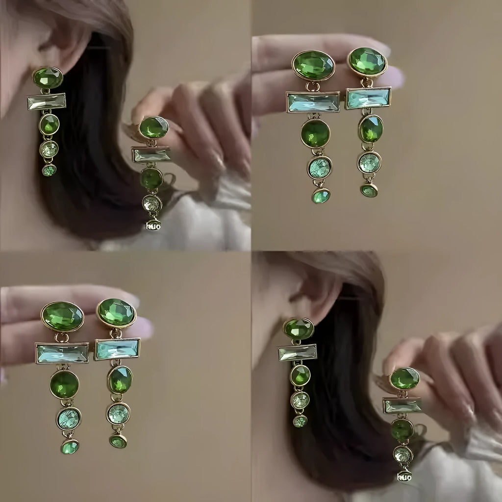 A pair of green gradient geometric alloy stud earrings with inlaid zircon stones and a dangling tassel.