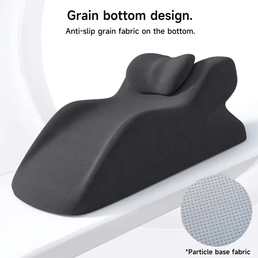 Stomach sleeper pillow in blue, designed for prone sleeping and reading.