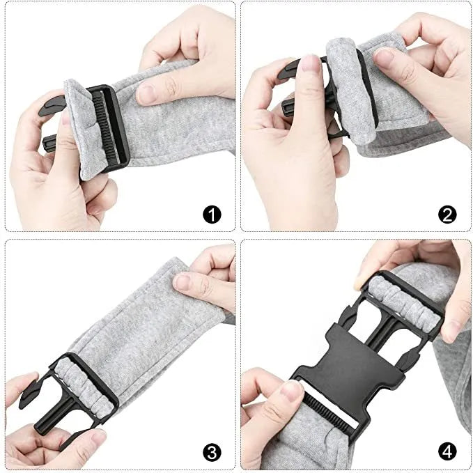 Light grey polyester pet sling carrier with cell phone pocket, worn around waist, holding a small dog