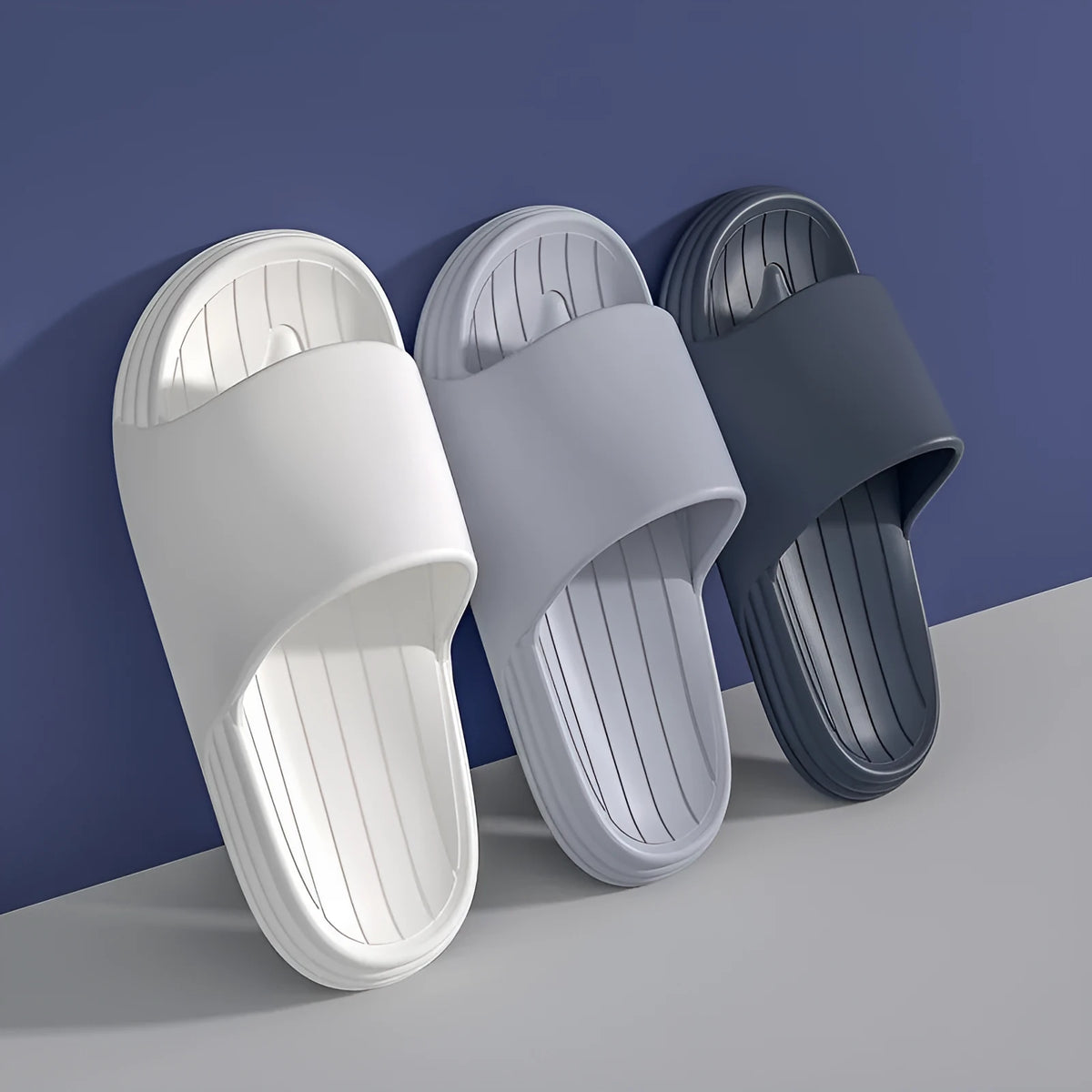 EVA indoor summer slippers with flower detail, shown in yellow, green, light grey, light pink, dark grey and white