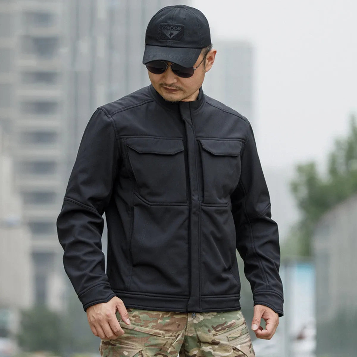 Bone Frog Peak Breaker soft shell tactical jacket in black, shown as a windproof and waterproof outdoor coat.