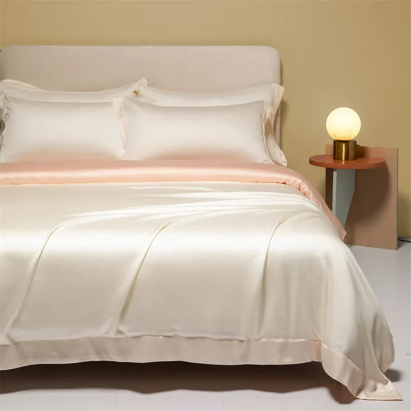 Luxury Lenzing Tencel duvet cover and pillowcase set in Aurora Blue colour on a modern bed.
