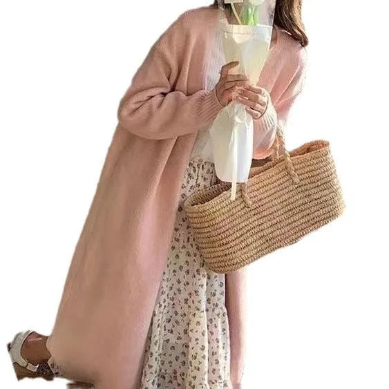 Women's loose fit knitted cardigan in khaki with V-neck and long sleeves.