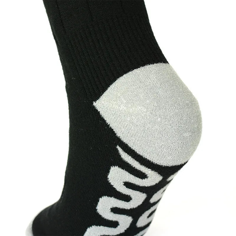 Smart APP controlled heated ski socks in black and gray mesh with far infrared heating and USB rechargeable battery