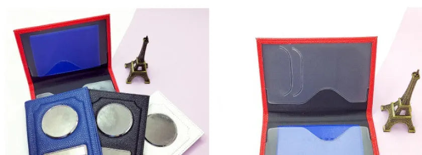 Black synthetic leather passport case with expandable design and aluminum lenses on a plain background