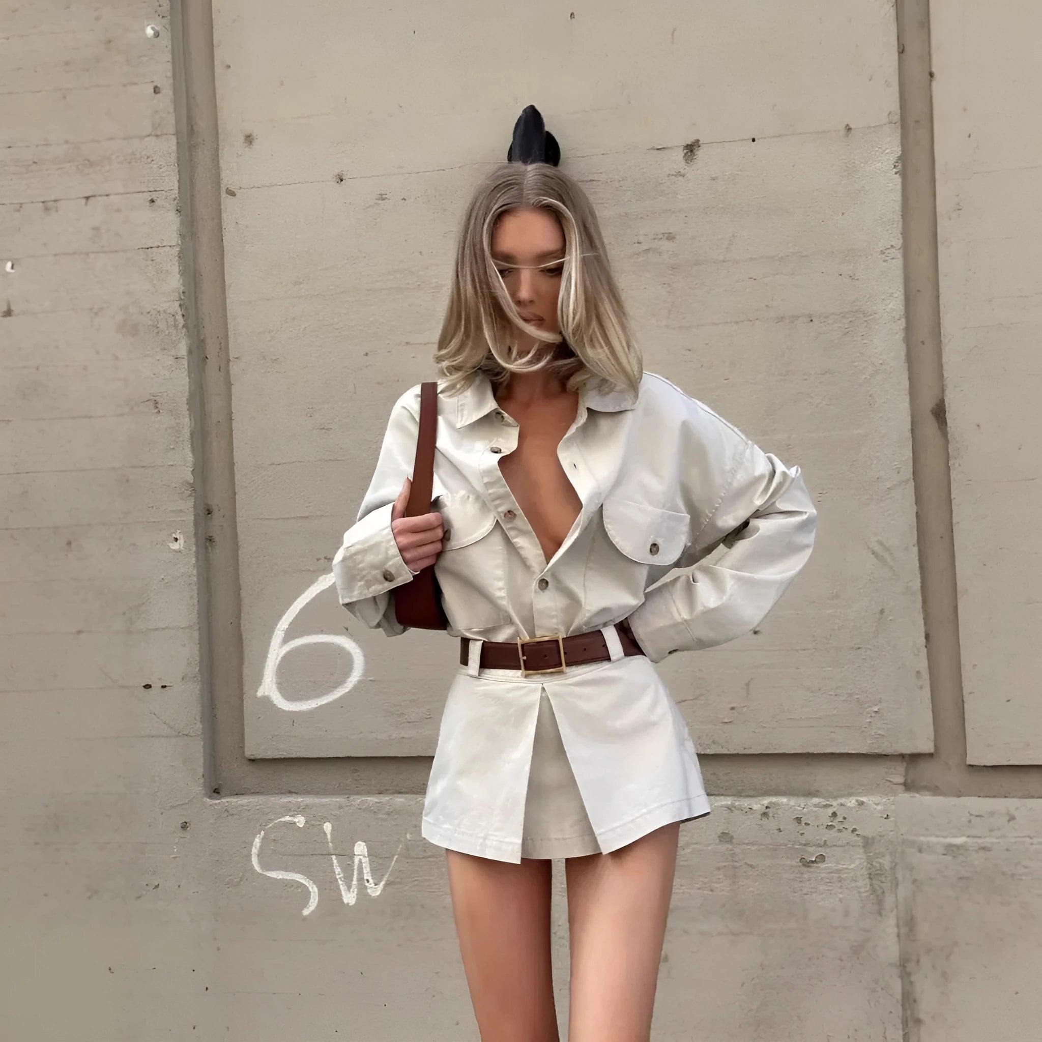 Gray long sleeve button front shirt dress with fake pocket and low waist short skirt in street style