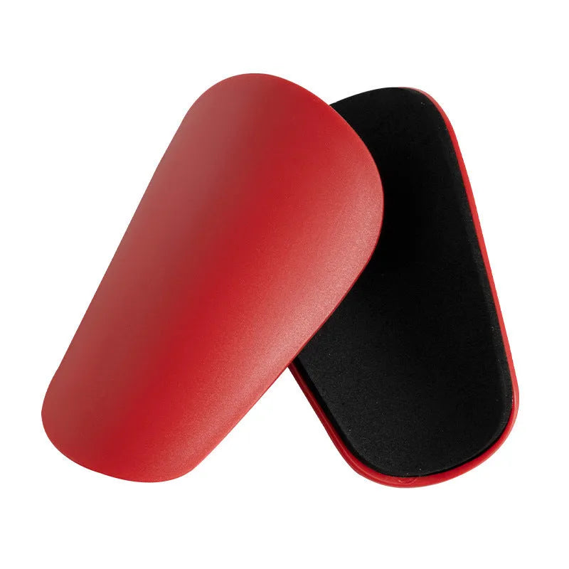 Pair of PU mini football shin guards for sports protection in various colours.