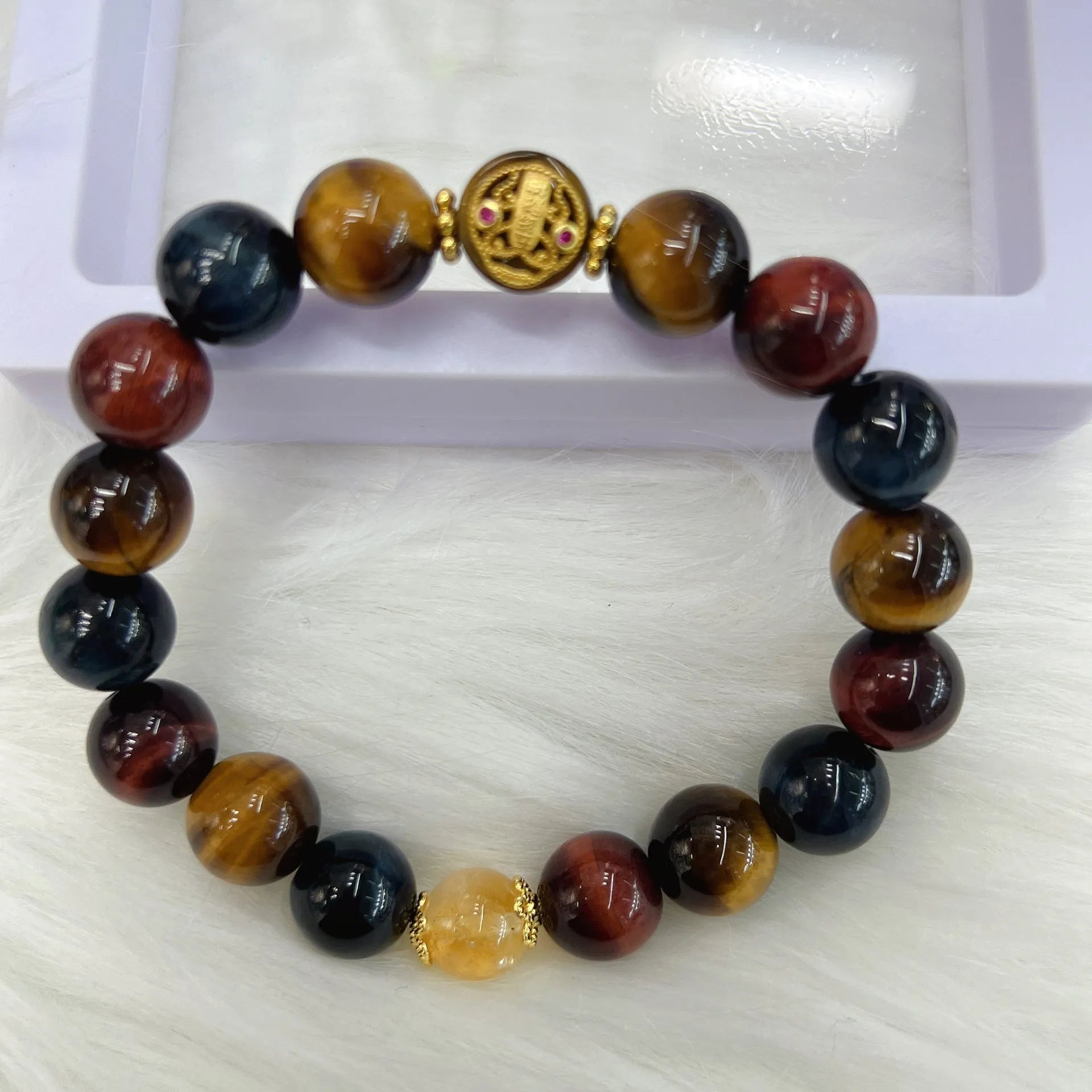 Natural colour tiger eye stone bead bracelet with maillard chain showing 18cm adjustable length