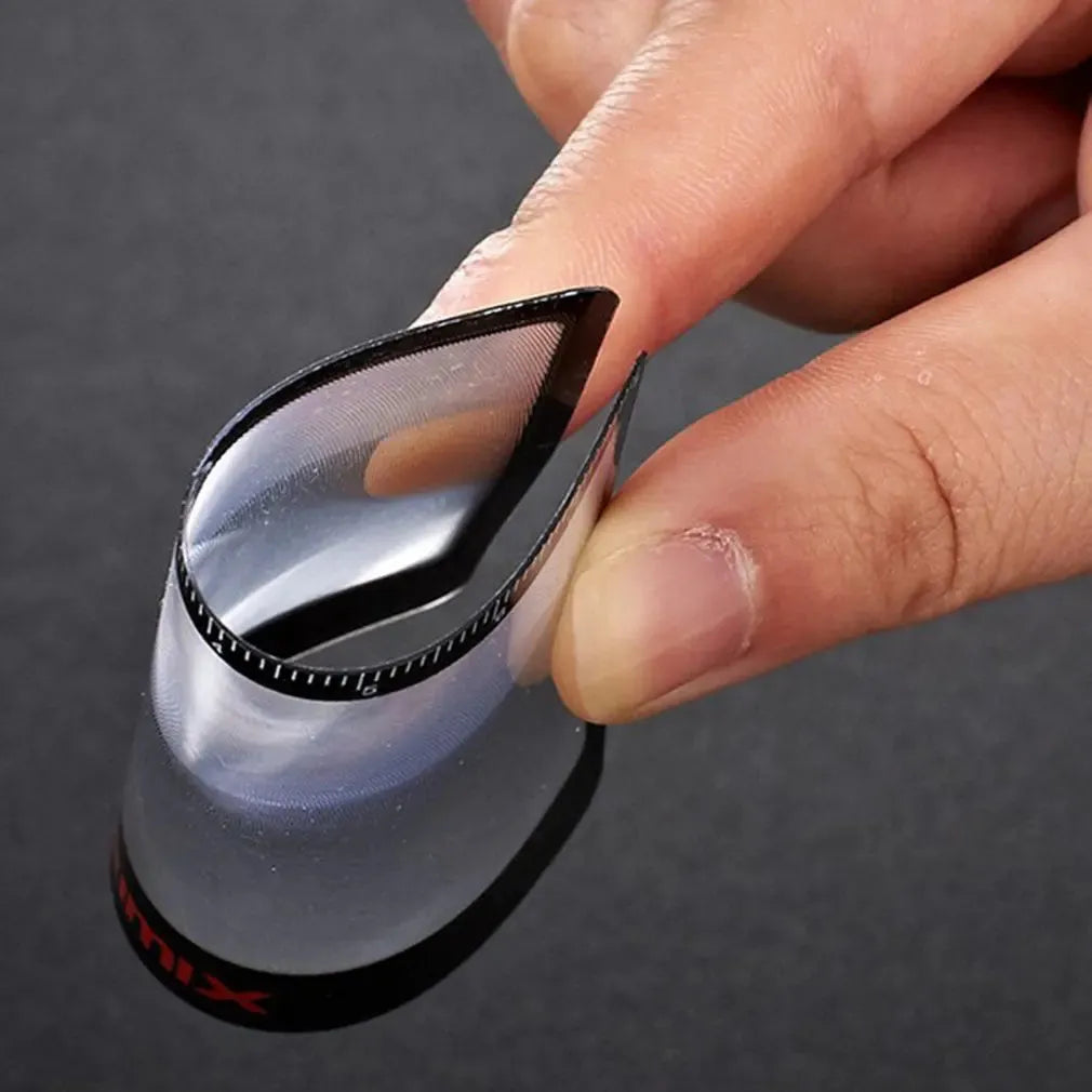 Portable black and white plastic card magnifier for close-up reading.