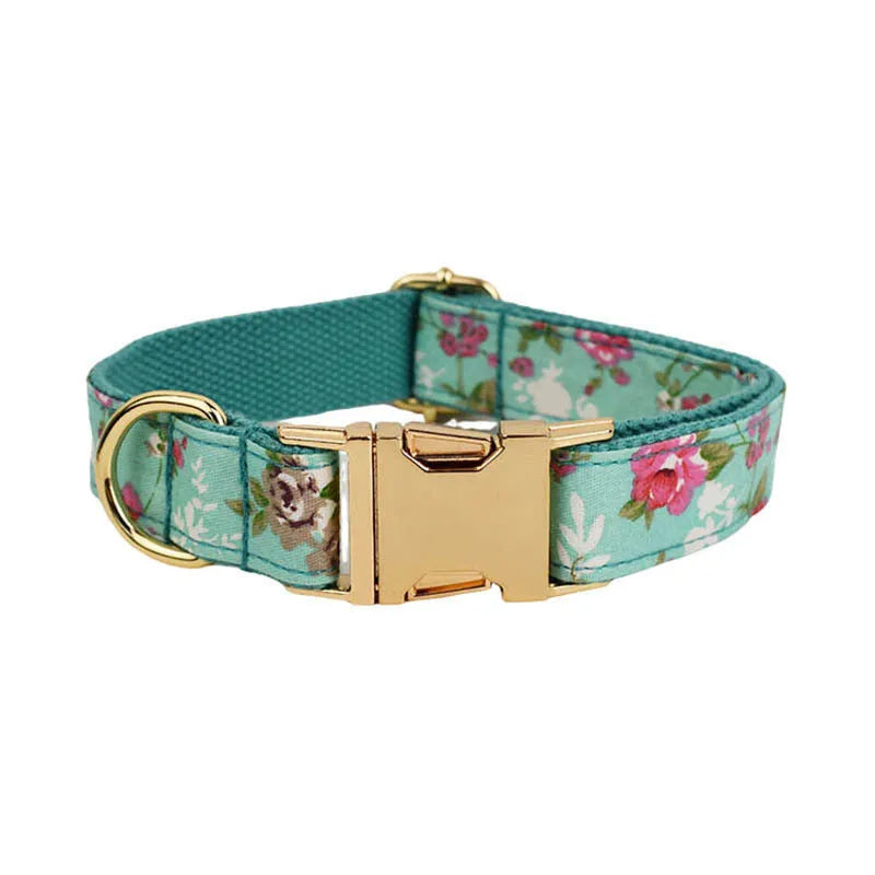 Fabric dog collar set with rose pattern detachable bow, matching leash, and optional vest in green background