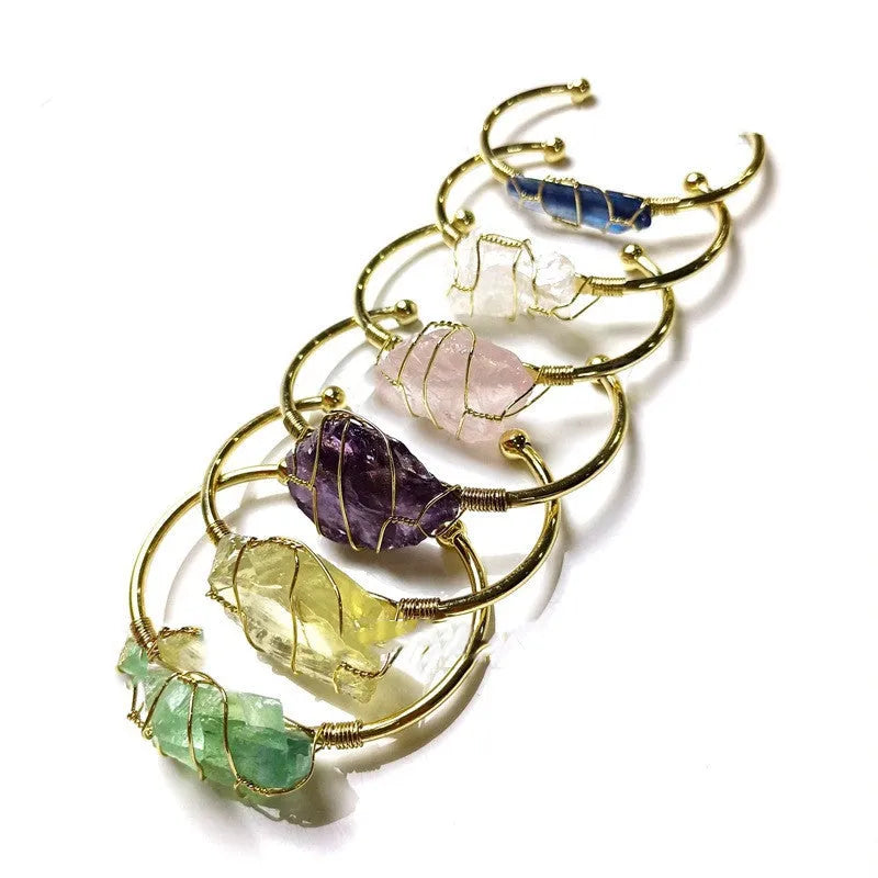 Gold winding geometric bracelet with natural crystal rough stones in bohemian ethnic design