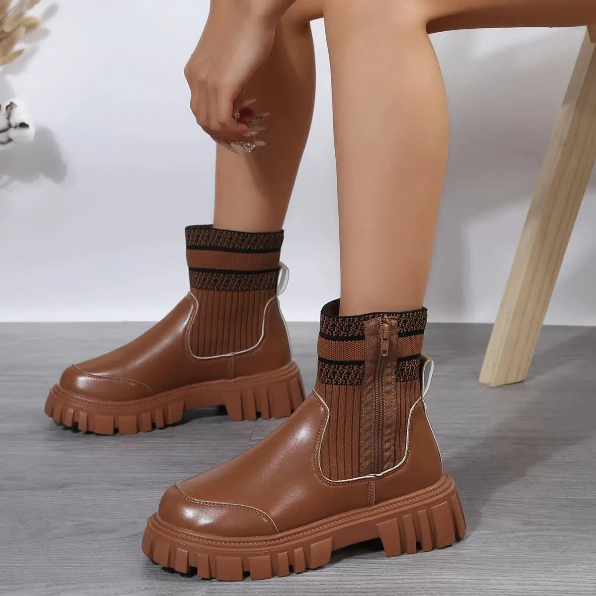 Women's mid-tube Martin boots with side zipper, elastic knitted patchwork, and non-slip rubber sole in beige, black, or brown.