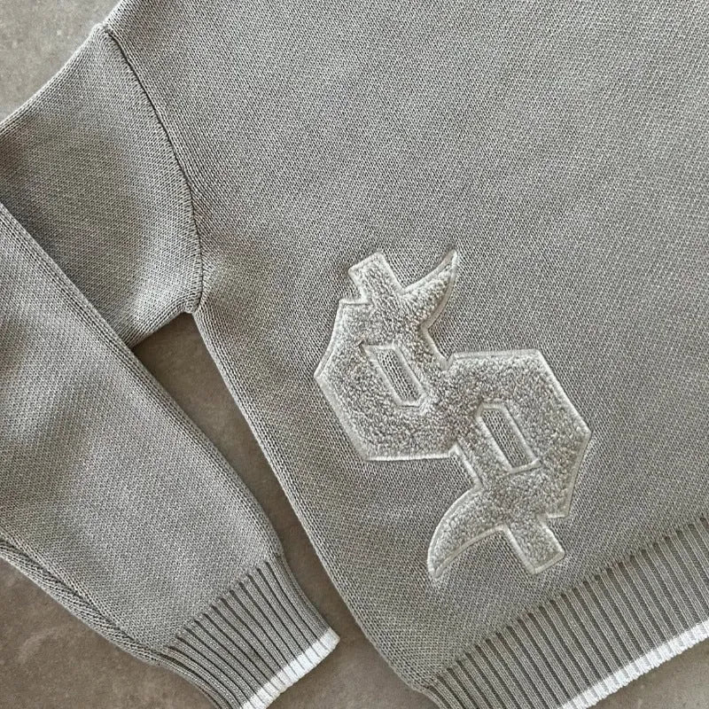 Grey jacquard patterned loose-fitting knitwear coat with long sleeves