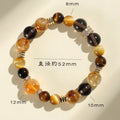 Natural yellow 10mm tower crystal string beads bracelet on wrist