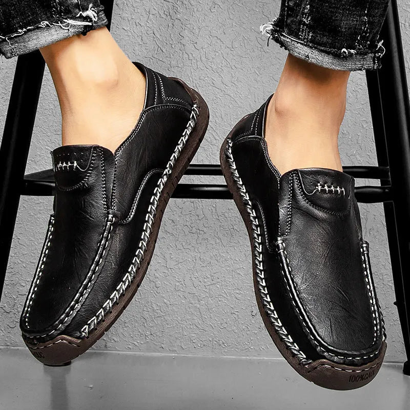 Men's casual leather shoes with soft rubber sole, round toe, two-layer cowhide upper, black colour, side stitching detail