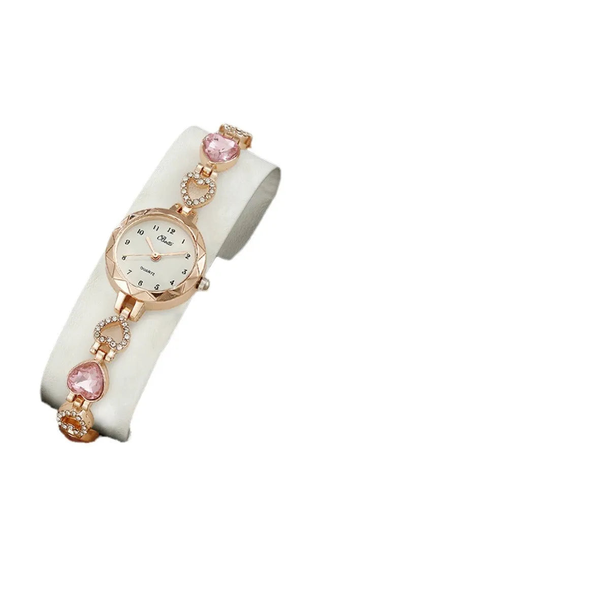 Women's quartz bracelet watch set with earrings necklace ring in pink finish on display