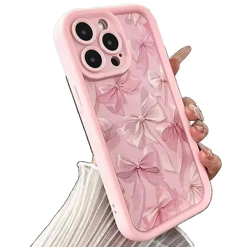 Pink silicone phone case with custom Tianyan ladder pattern and bow detail, compatible with Apple iPhone models