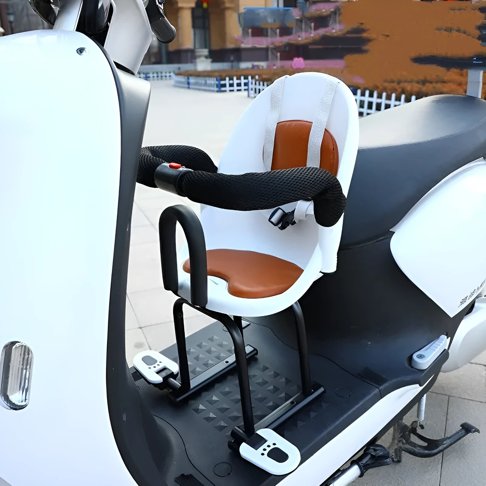 High carbon steel front safety seat for a child's battery scooter in black, red, or white.