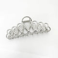 Large minimalist hair clip with tassel decoration in gold or silver electroplated finish