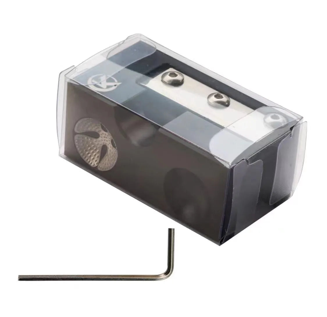 Matte black all-metal billiard cue leather tip repair tool on pool table